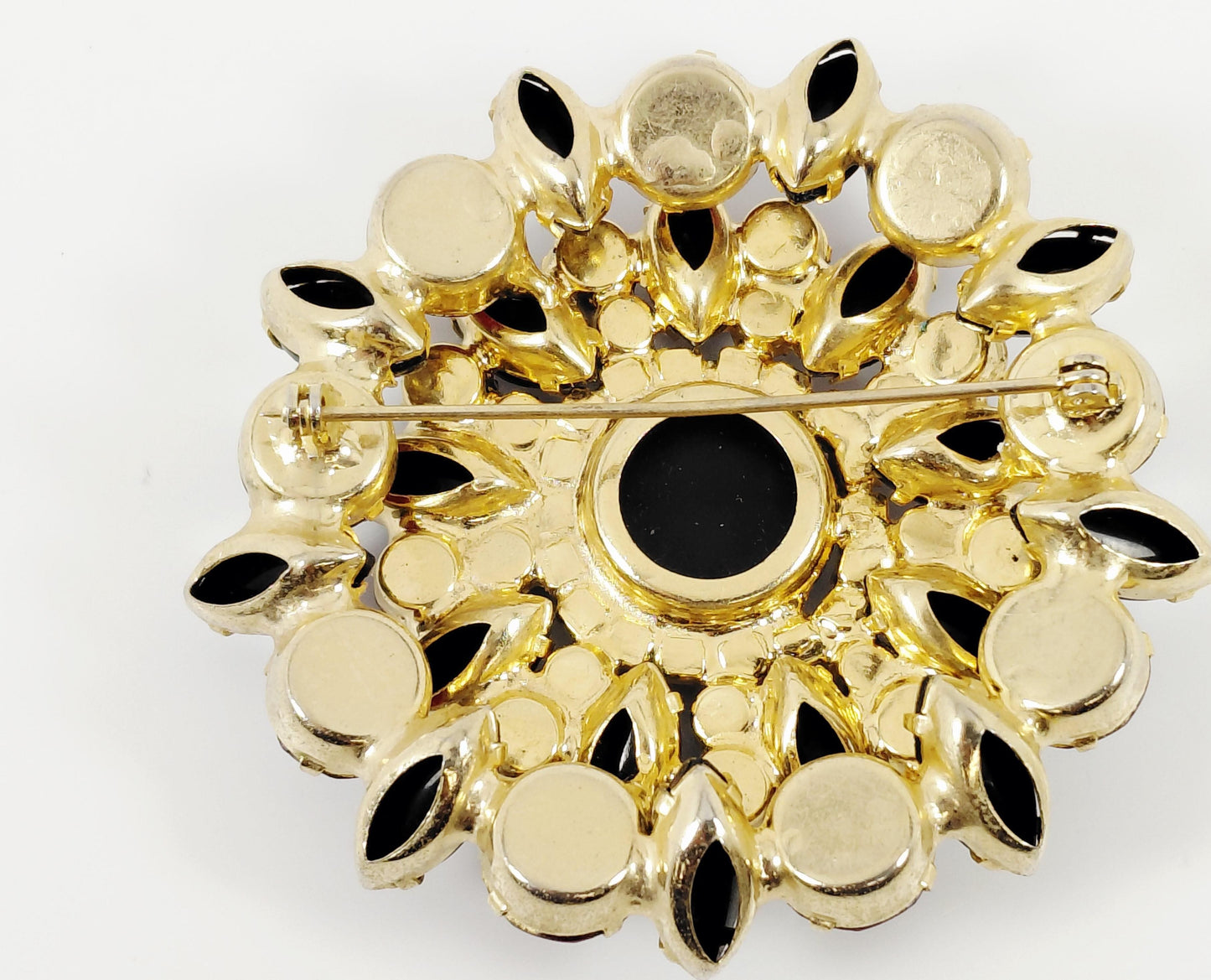 Gold back of brooch