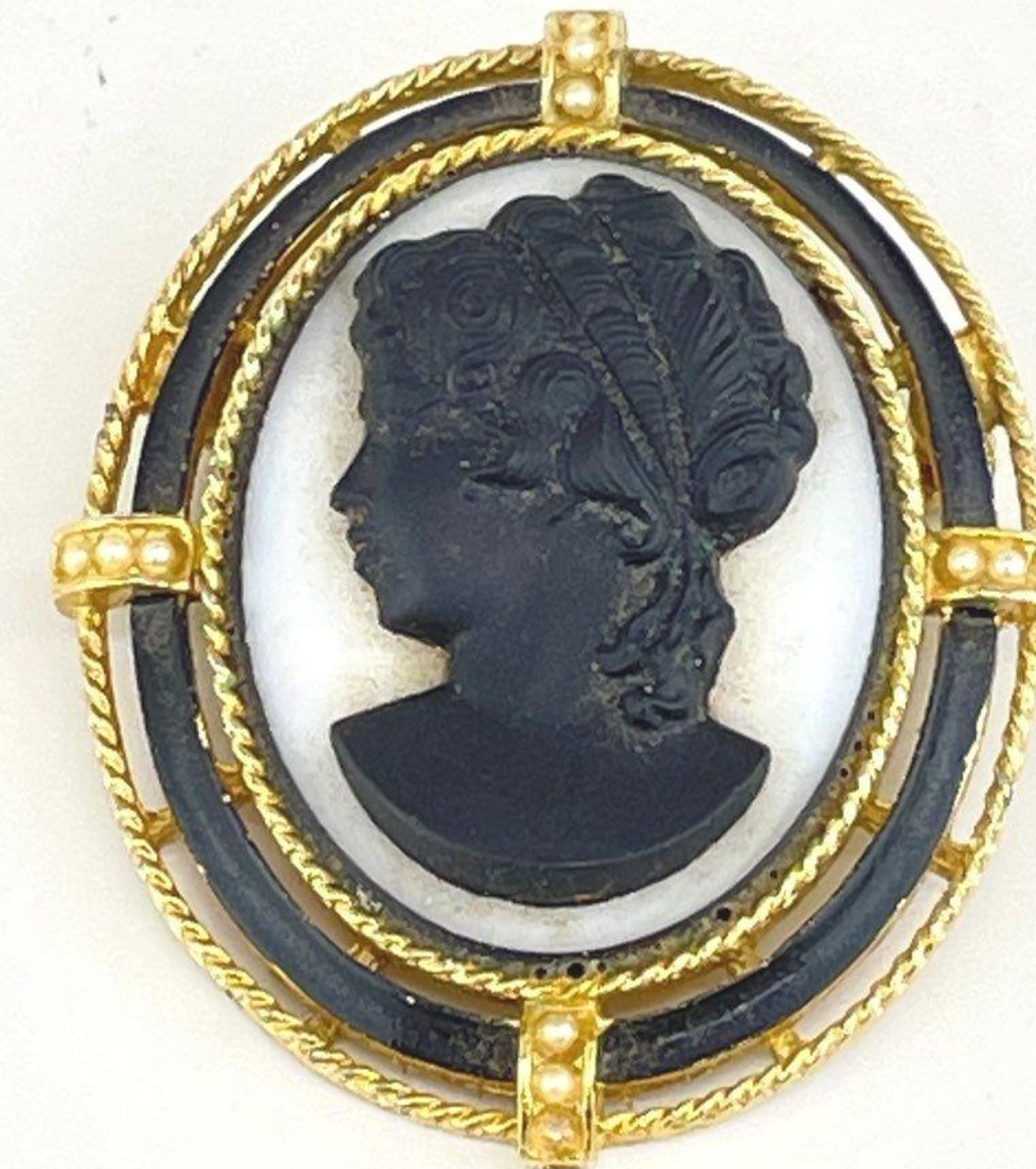 Black and white cameo brooch