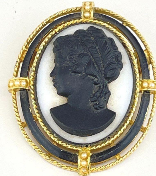 Black and white cameo brooch