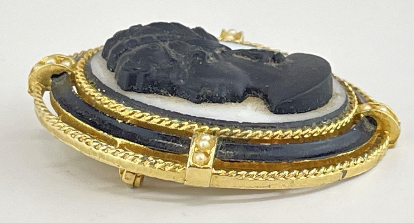 Black and white cameo brooch