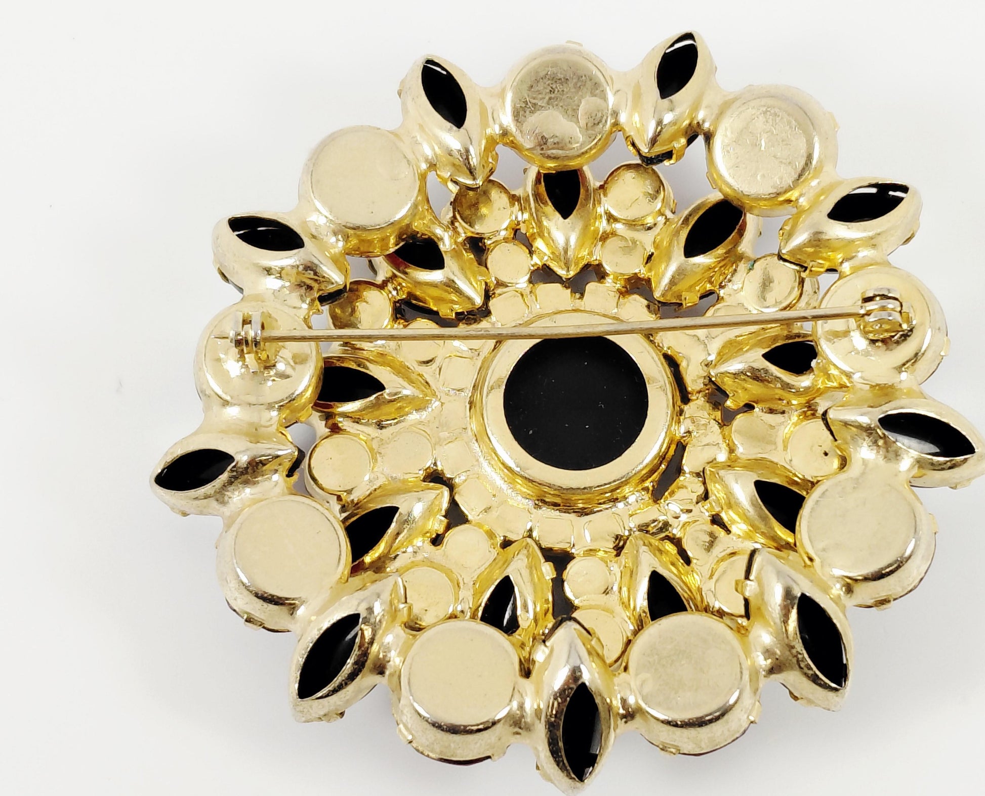 Gold back of brooch 